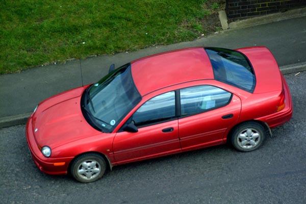 Red chrysler neon.